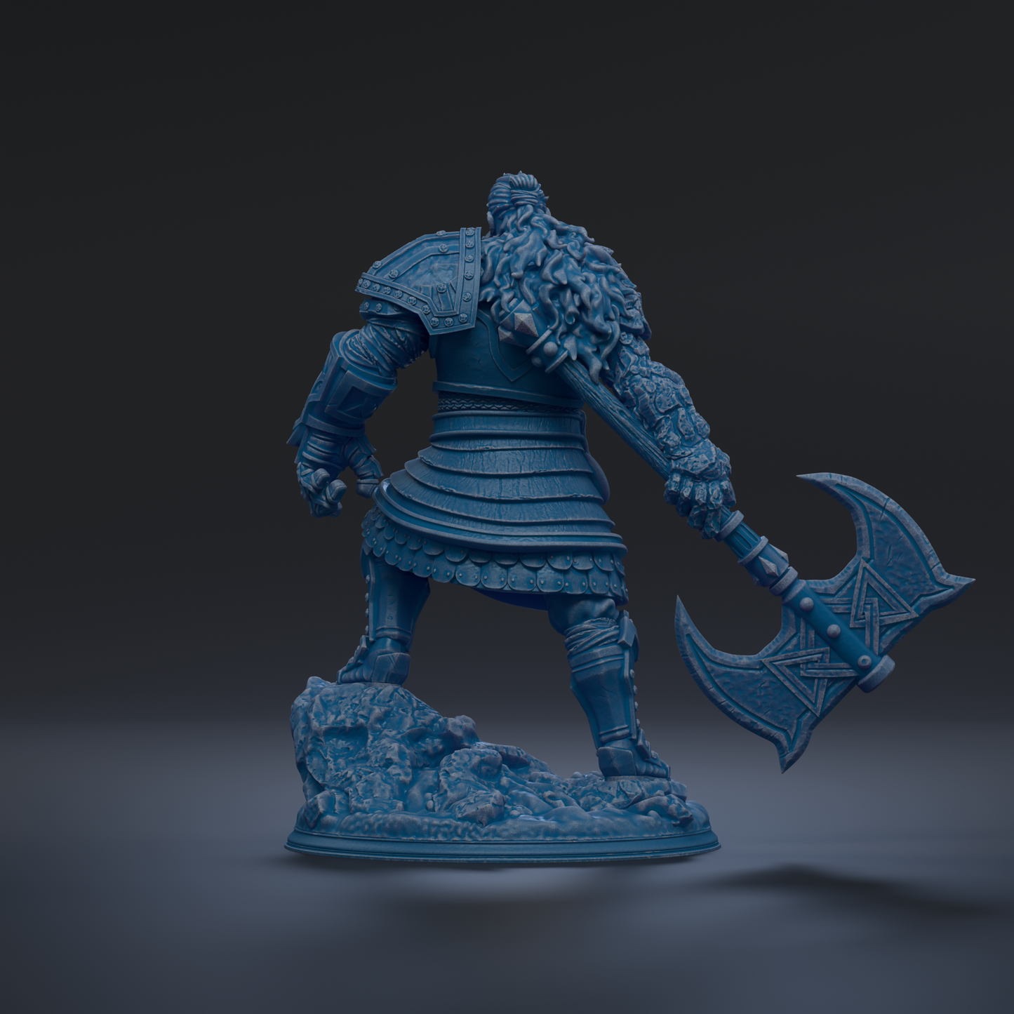 A blue, armored warrior figure stands on a rocky base, holding a large, ornate weapon.