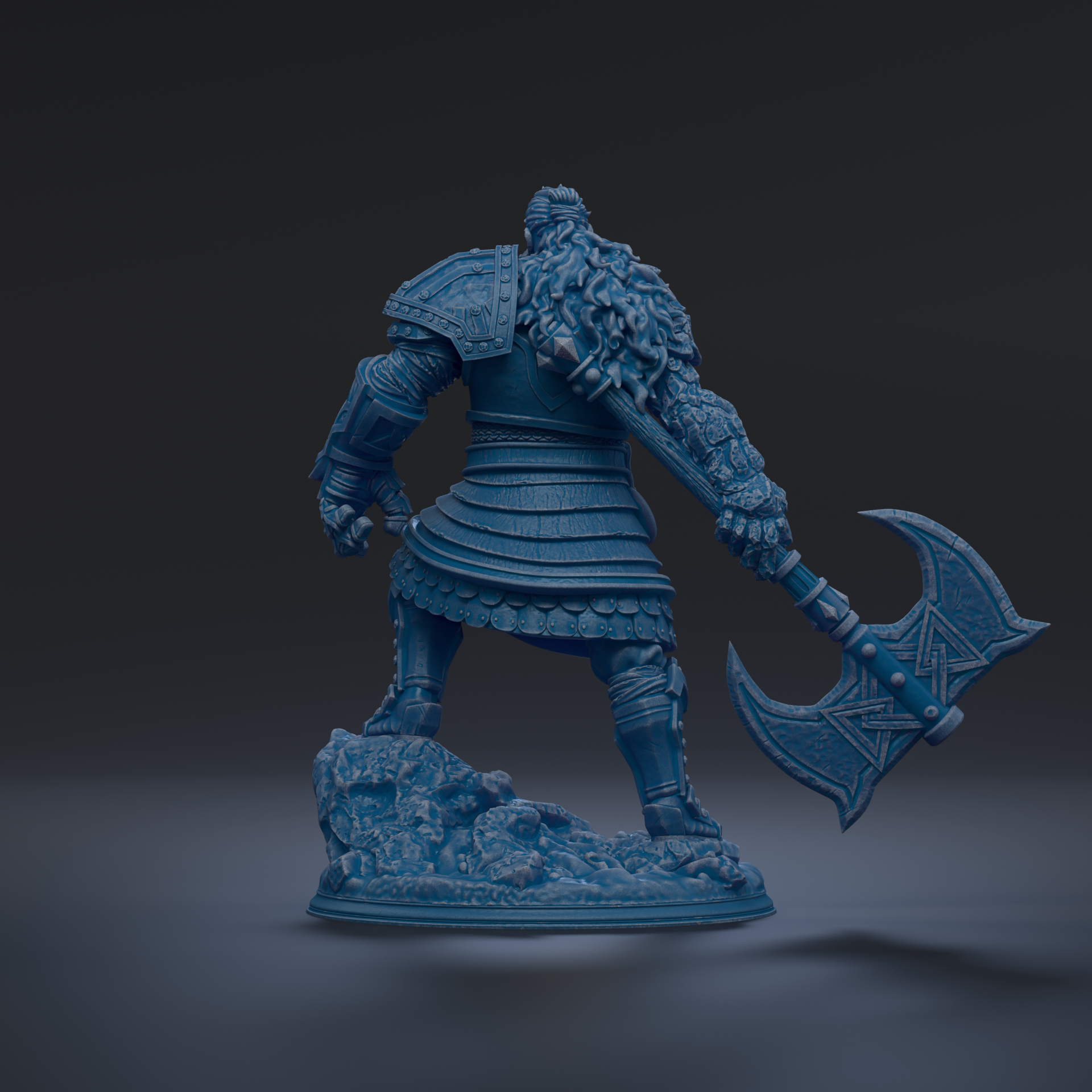 A blue, armored warrior figure stands on a rocky base, holding a large, ornate weapon.