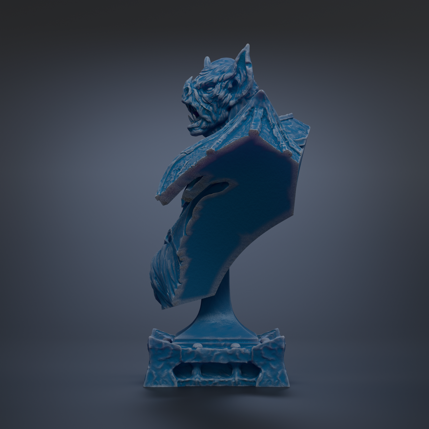 A blue, sculpted statue of a bat-like creature with a fierce expression, standing on a pedestal against a dark background.