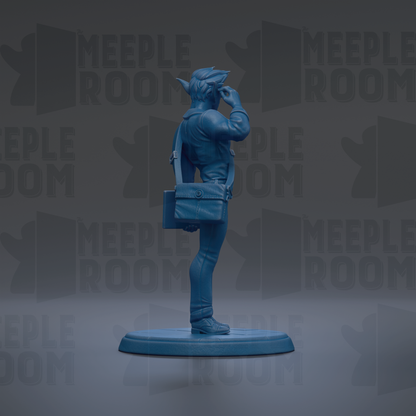 A blue figurine of a person standing on a platform, holding a bag in their hand.