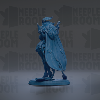 A blue figurine of a winged, winged creature with a long tail, standing on a base and facing to the right.