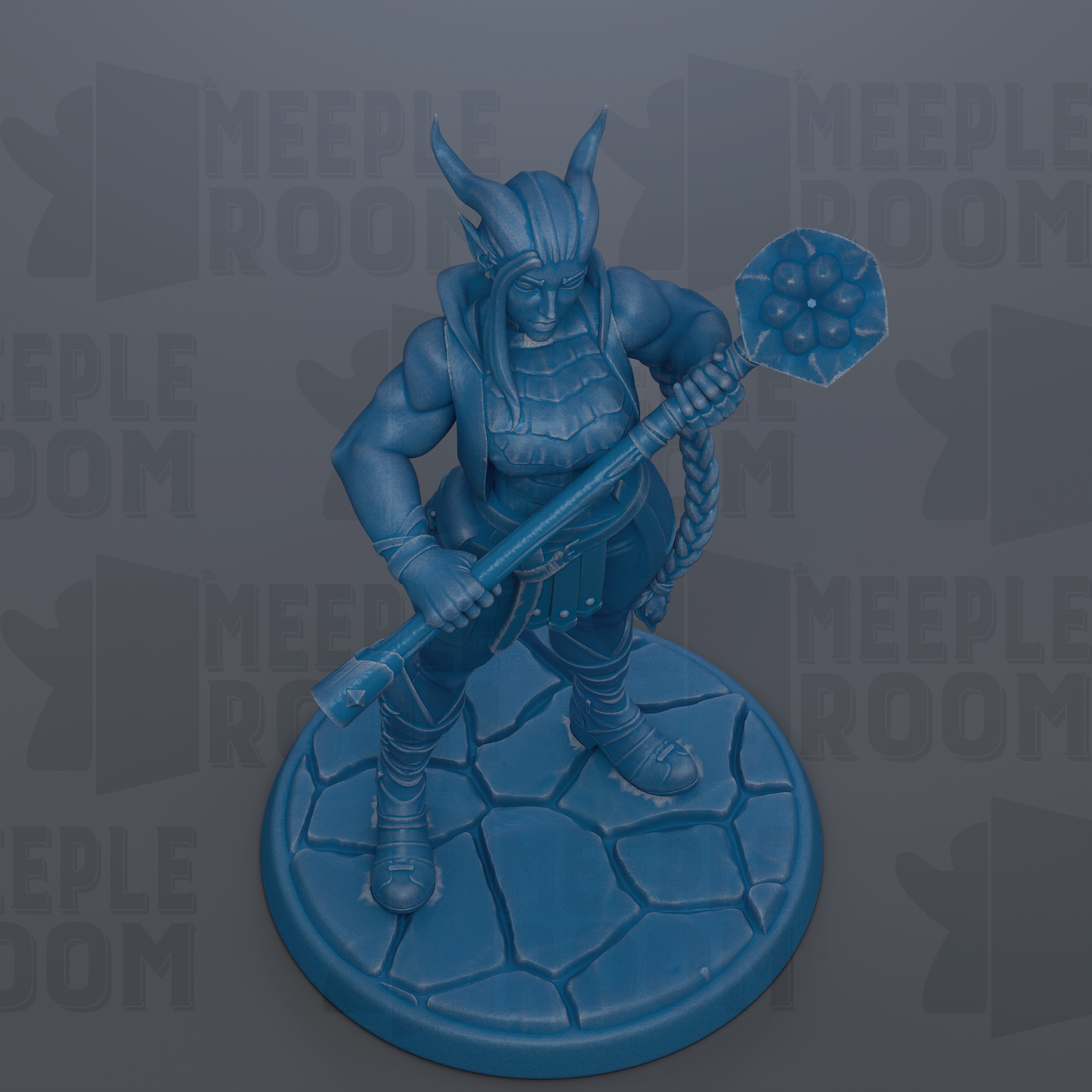 A blue figurine of a warrior-like character holding a weapon and standing on a rocky base.