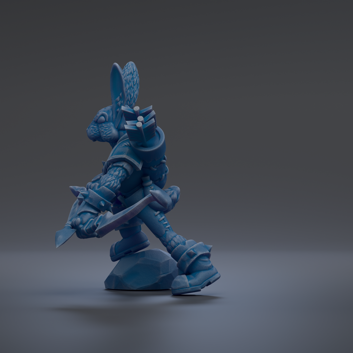 A blue, cartoonish-looking character with a pointed hat and a sword, standing on a rock.