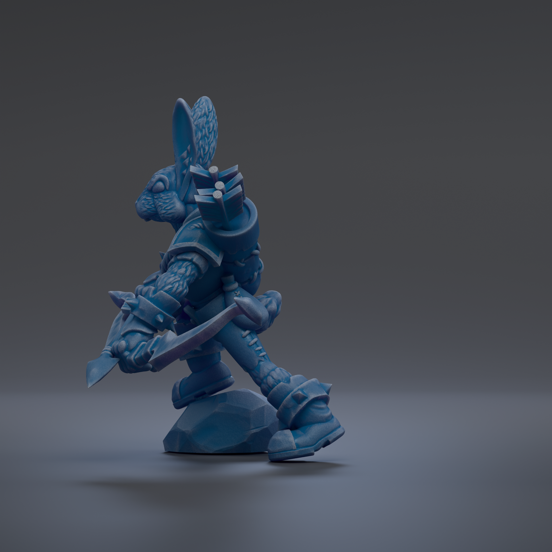 A blue, cartoonish-looking character with a pointed hat and a sword, standing on a rock.