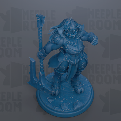 A blue figurine of a warrior-like character holding a weapon and standing on a platform.