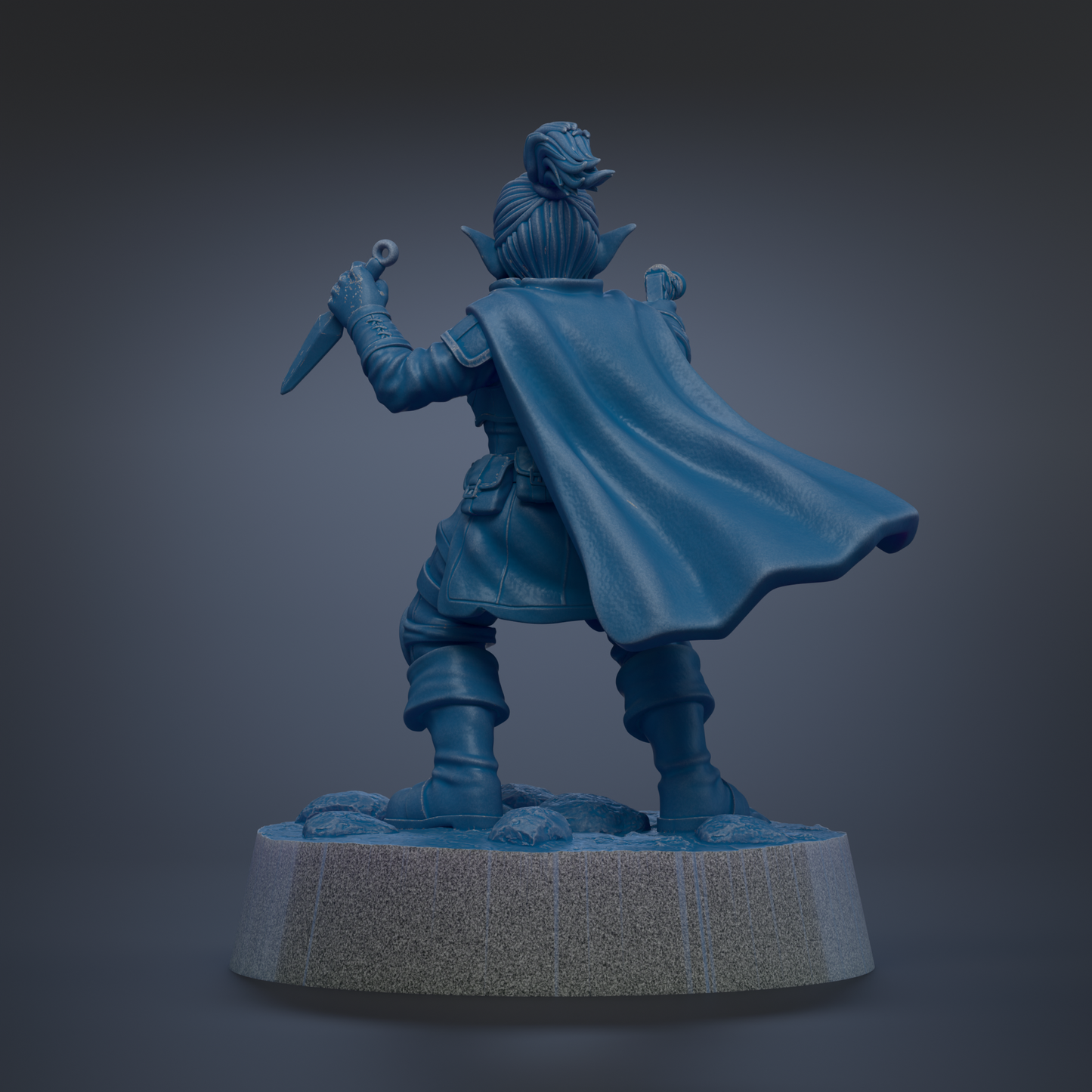 A blue figurine of a person with a cape and a sword, standing on a pedestal.