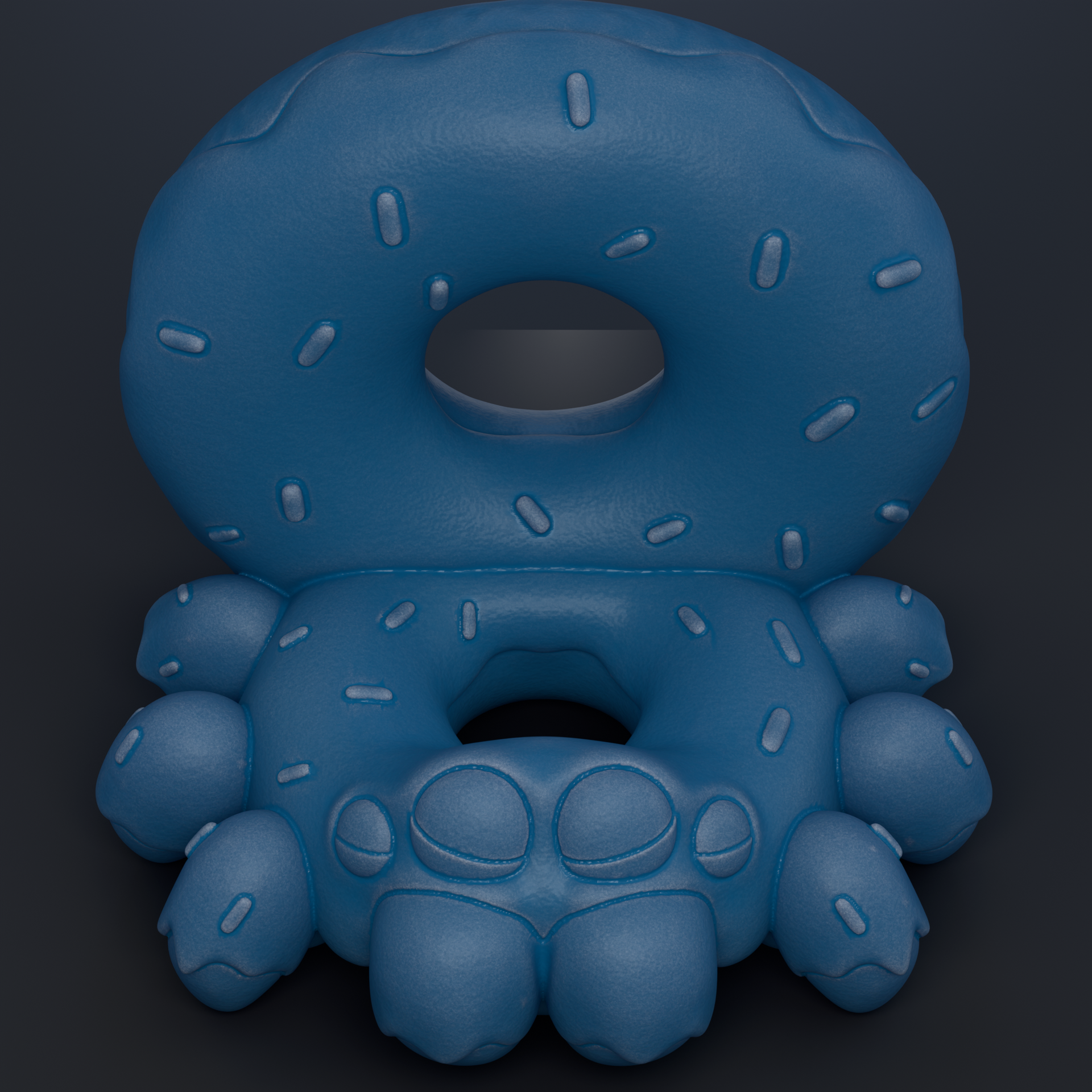 A blue donut-shaped object with a hole in the center, sitting on a dark background.