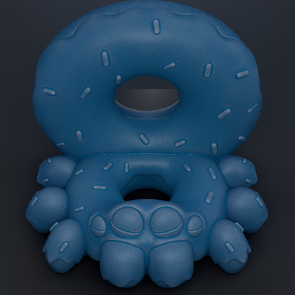 A blue donut-shaped object with a hole in the center, sitting on a dark background.