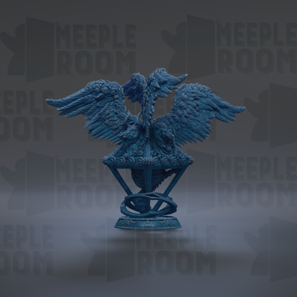 A blue, winged statue of a mythical creature, possibly a dragon or phoenix, with intricate details and a prominent head.