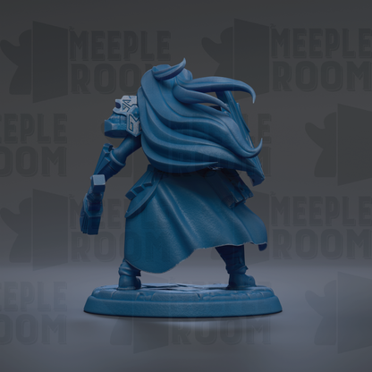 A blue figurine of a character with long hair and a flowing cape, standing on a base.