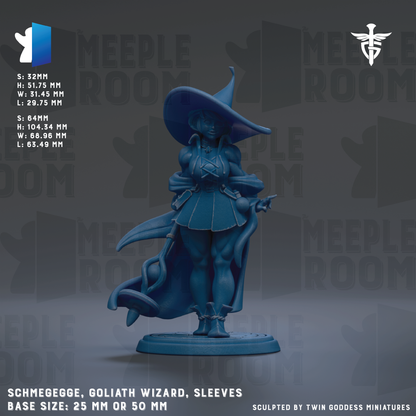 a figurine of a woman dressed as a wizard, with a large hat and a flowing cape. The figurine is described as a "SCHMEEGGG, GOLIATH WIZARD, SLEEVES" and is shown in a base size of 25 mm or 50 mm. The figurine is sculpted by Twin Goddess Miniatures.