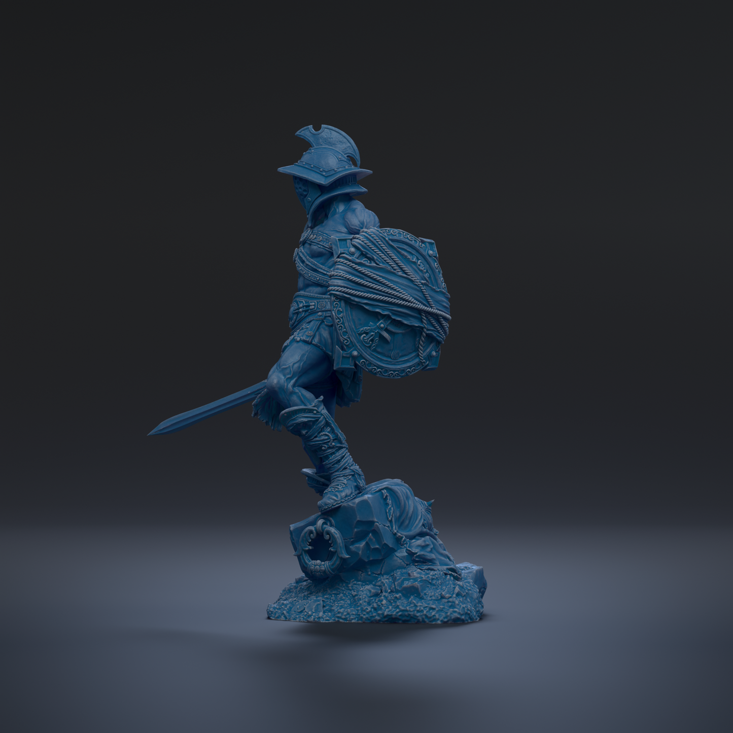 A blue statue of a warrior figure holding a shield and sword, standing on a rock formation against a dark background.
