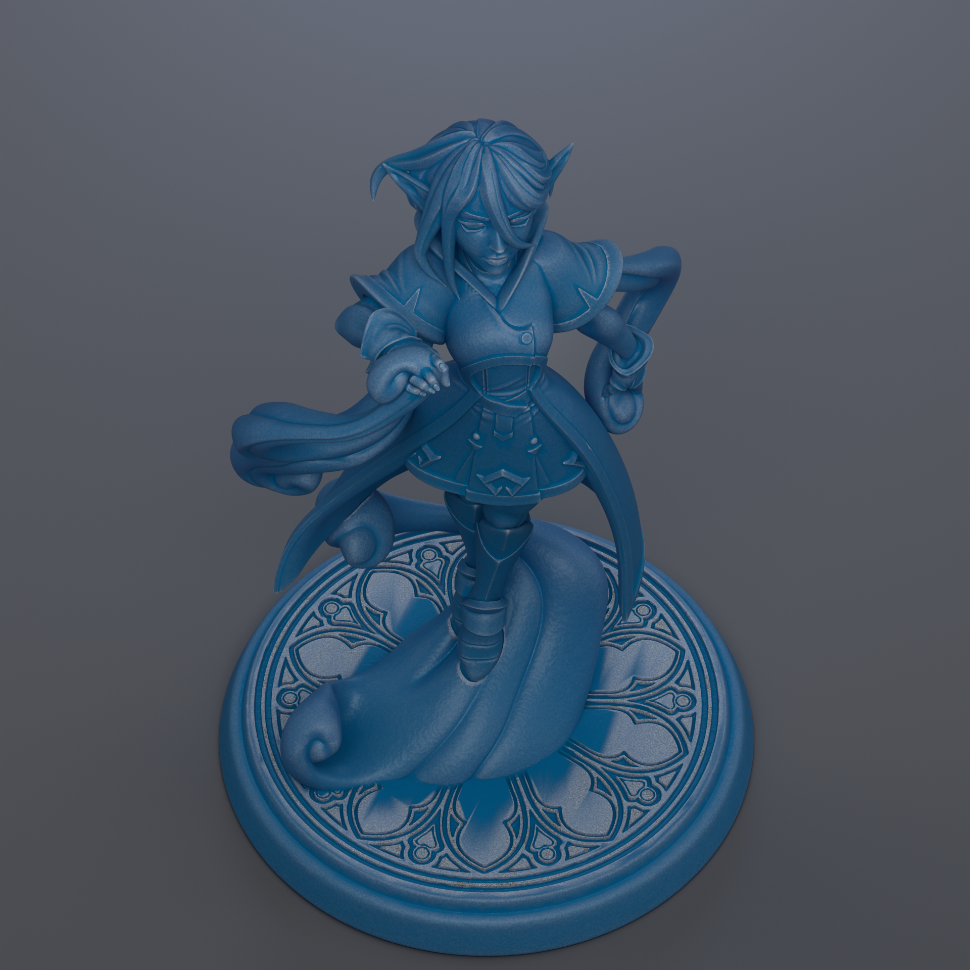 A blue figurine of a character with a flowing cape and a flowing skirt, standing on a decorative base with a floral pattern.