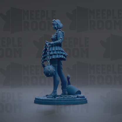 A blue figurine of a woman standing on a platform, holding a chain and a round object.