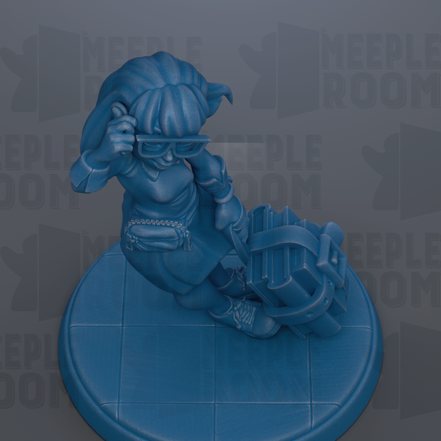 A blue figurine of a person sitting on a blue platform, holding a suitcase and wearing glasses.