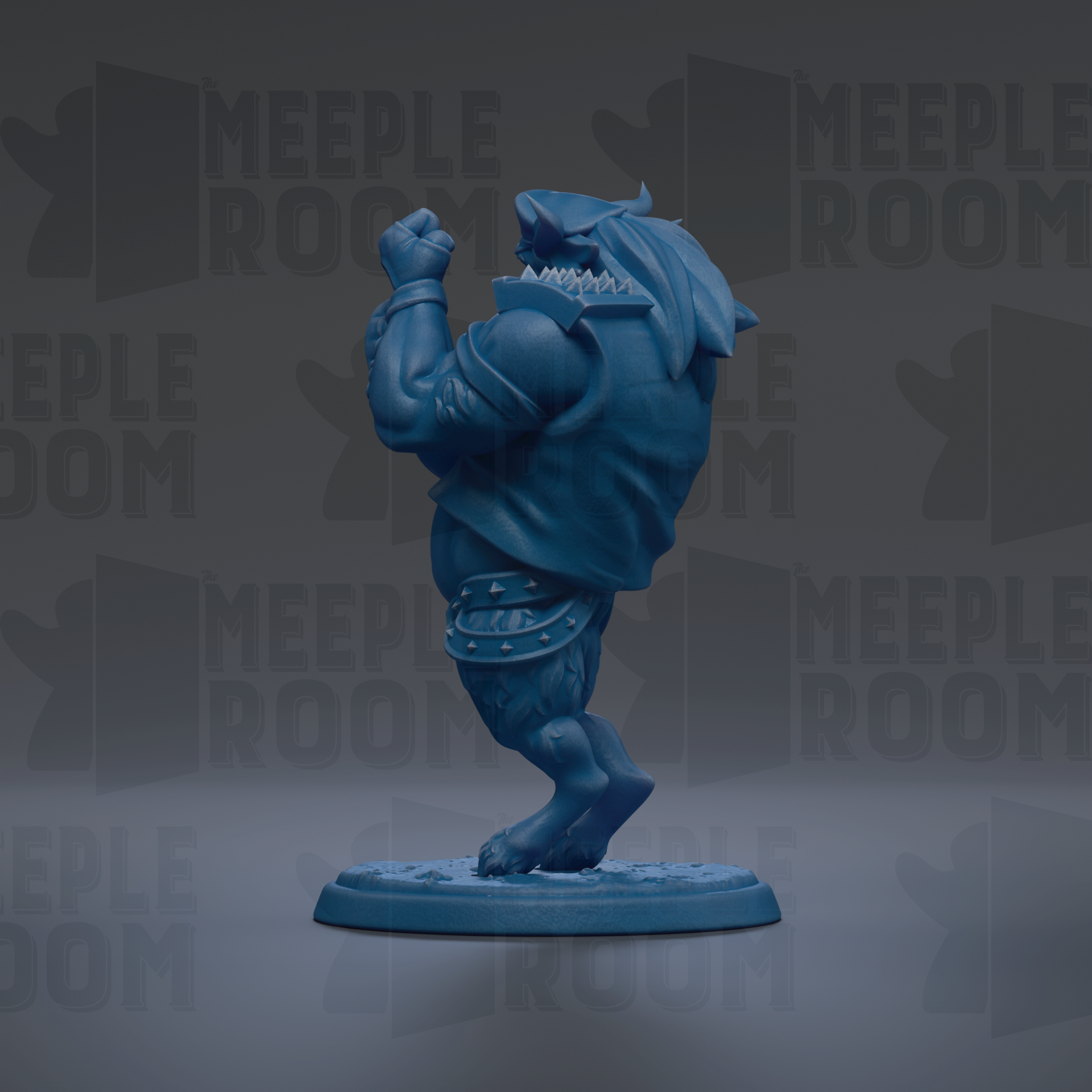 A blue figurine of a muscular, armored character with a raised fist, standing on a base.