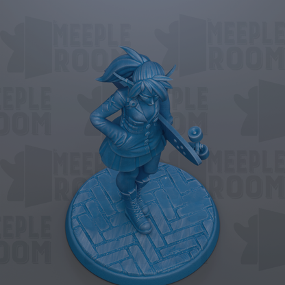 A blue figurine of a person holding a skateboard, standing on a brick surface.