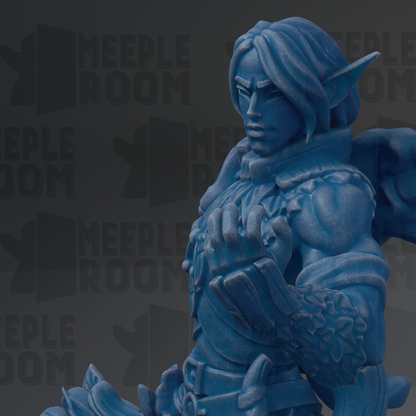 A close-up of a blue, detailed statue of a character with a serious expression, wearing a decorative outfit and holding a weapon.