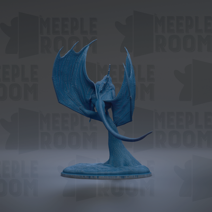 A blue dragon figurine with wings spread, standing on a base.
