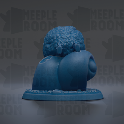 A blue, abstract sculpture resembling a brain or skull-like shape, sitting on a base.