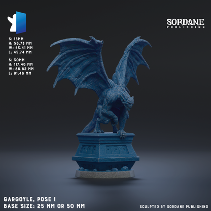 A blue dragon statue with wings spread, standing on a pedestal.