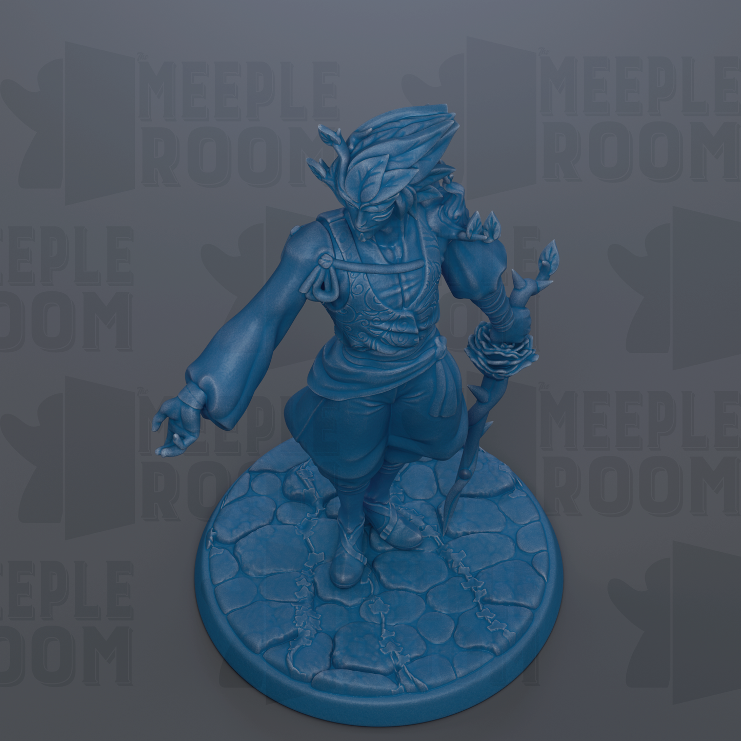 A blue figurine of a character with a sword and a staff, standing on a stone base.