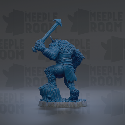 A blue figurine of a fantastical creature, possibly a dragon or monster, is depicted in a dynamic pose, holding a large weapon.