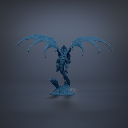 A blue dragon statue with outstretched wings stands on a rock against a dark background.
