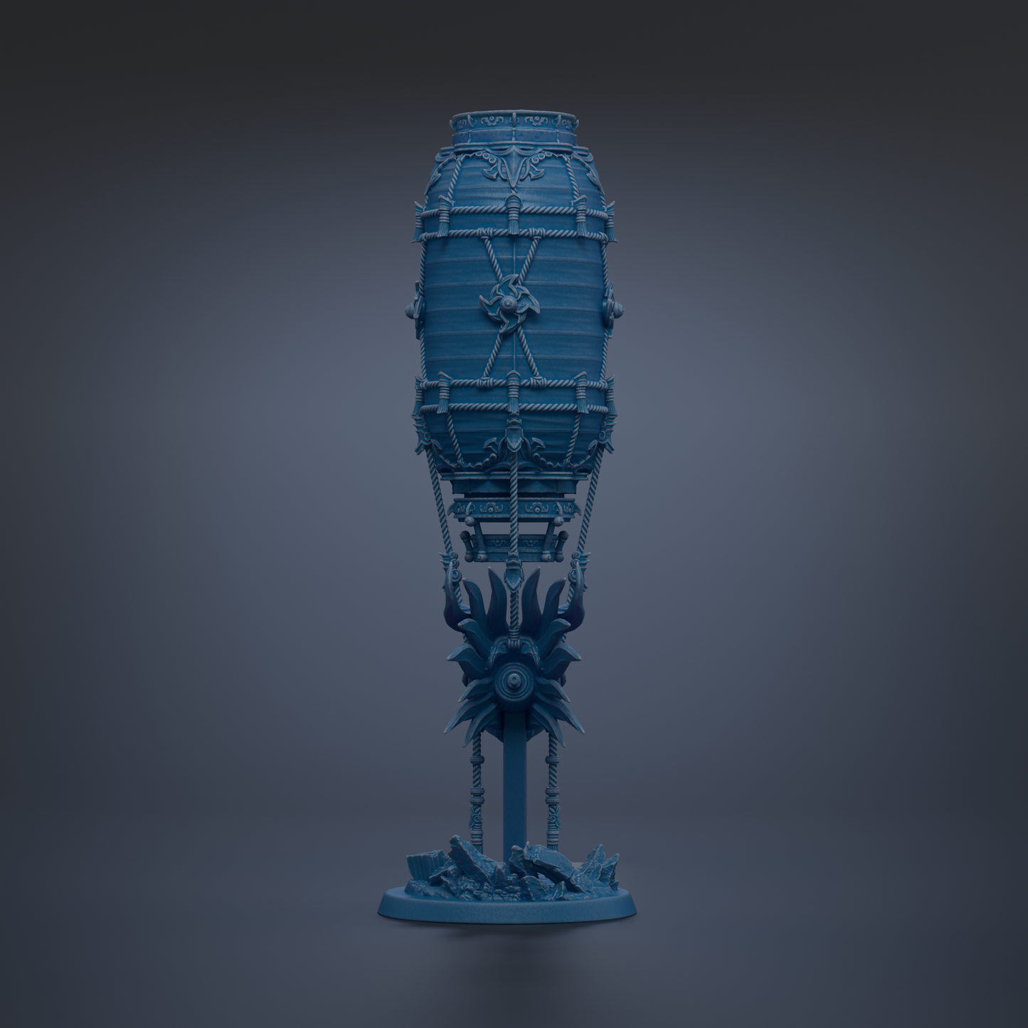 A blue, cylindrical object with intricate designs and decorations, standing alone against a dark background.