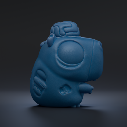 A blue, cartoon-like figurine with a brain-like shape on top, sitting on a dark surface.
