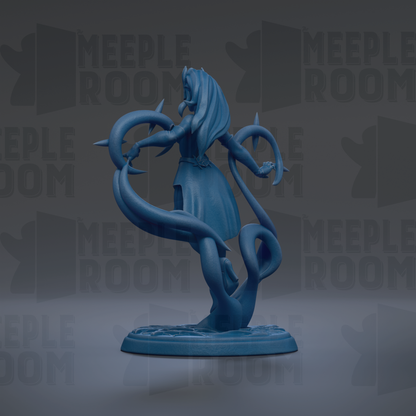 A blue figurine of a woman with long hair and a flowing dress, holding a staff, standing on a base.