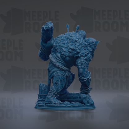 A blue statue of a large, furry creature with a raised fist, standing on a pedestal.
