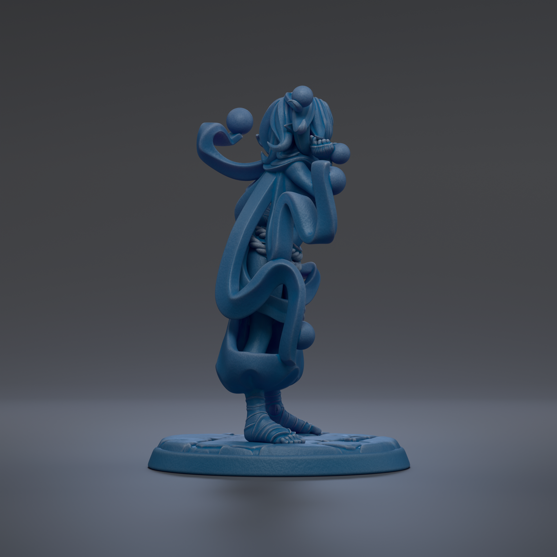 A blue, abstract sculpture with a unique, organic shape and design.