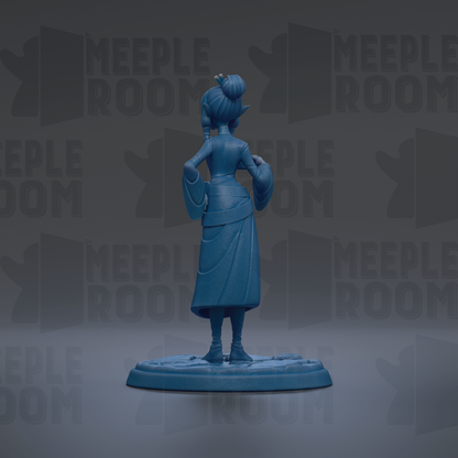 A blue figurine of a woman with a bun on her head, standing on a base and facing away from the camera.