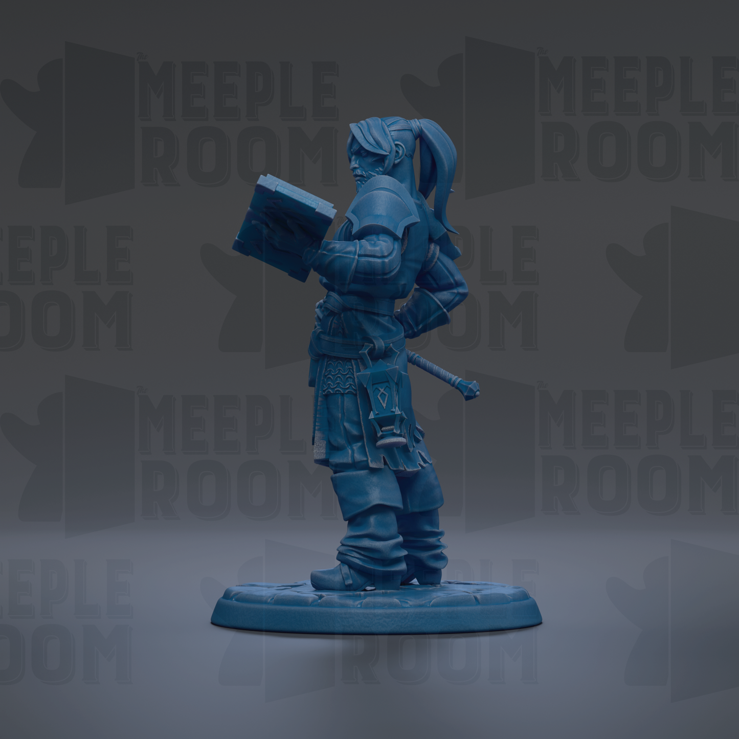 A blue figurine of a person holding a book, standing on a base.