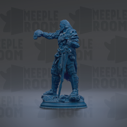 A blue figurine of a warrior standing on a pedestal, holding a weapon and wearing armor.