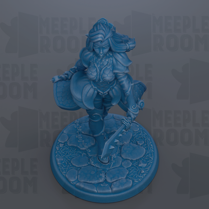 A blue figurine of a female character with flowing hair and a flowing skirt, holding a sword and standing on a rocky base.