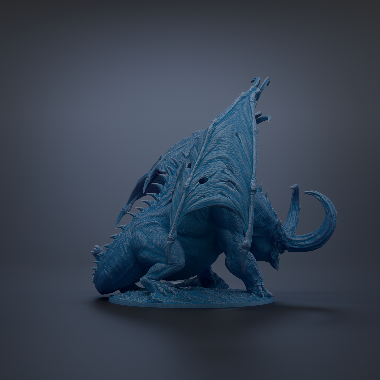 A blue dragon figurine with wings spread, standing on a base.