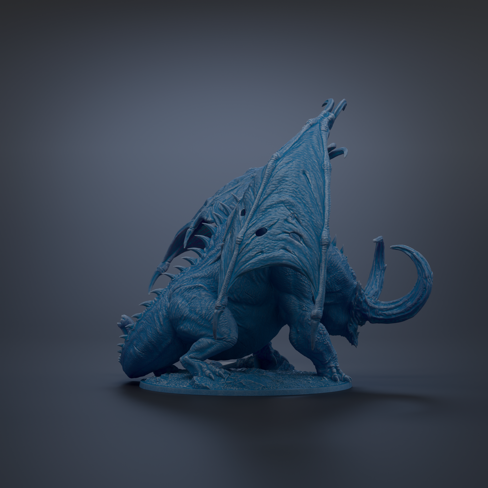 A blue dragon figurine with wings spread, standing on a base.