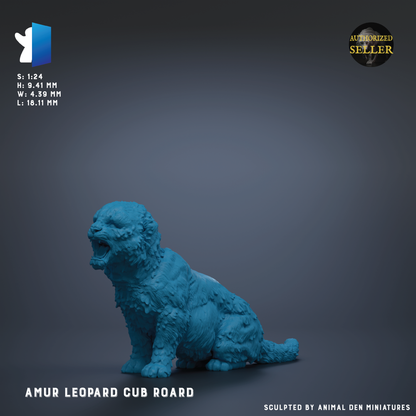 a blue figurine of a leopard cub, specifically the Amur Leopard Cub Roard, sitting on a gray background.