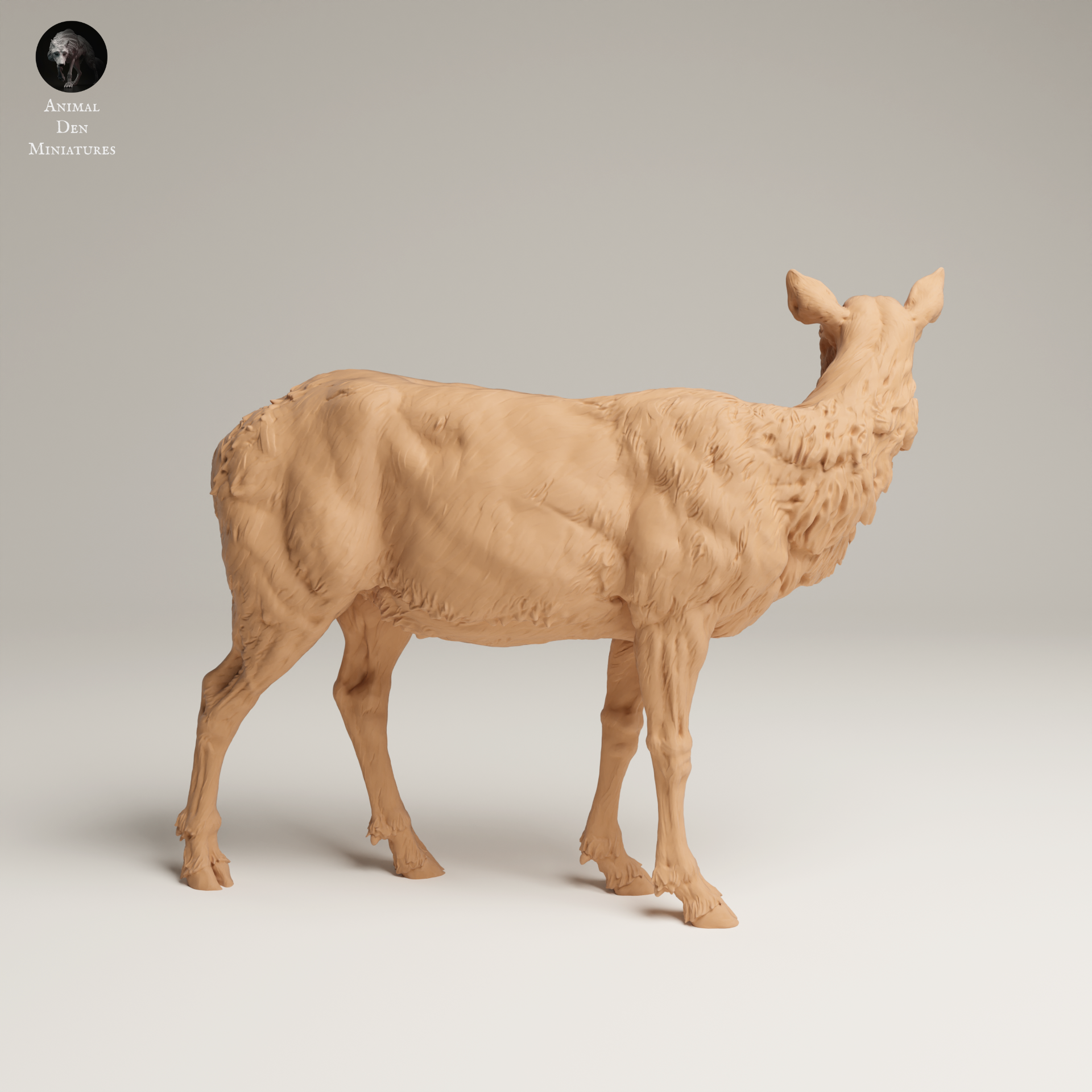 a wooden model of a sheep on a white background