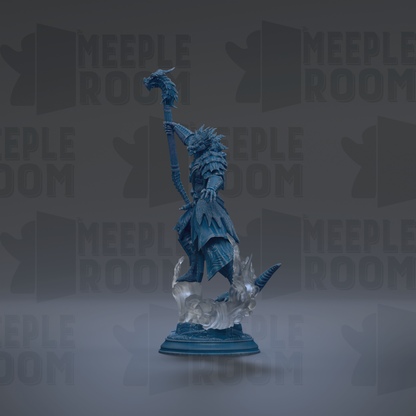 A blue statue of a figure holding a staff and a dragon on top, standing on a pedestal.