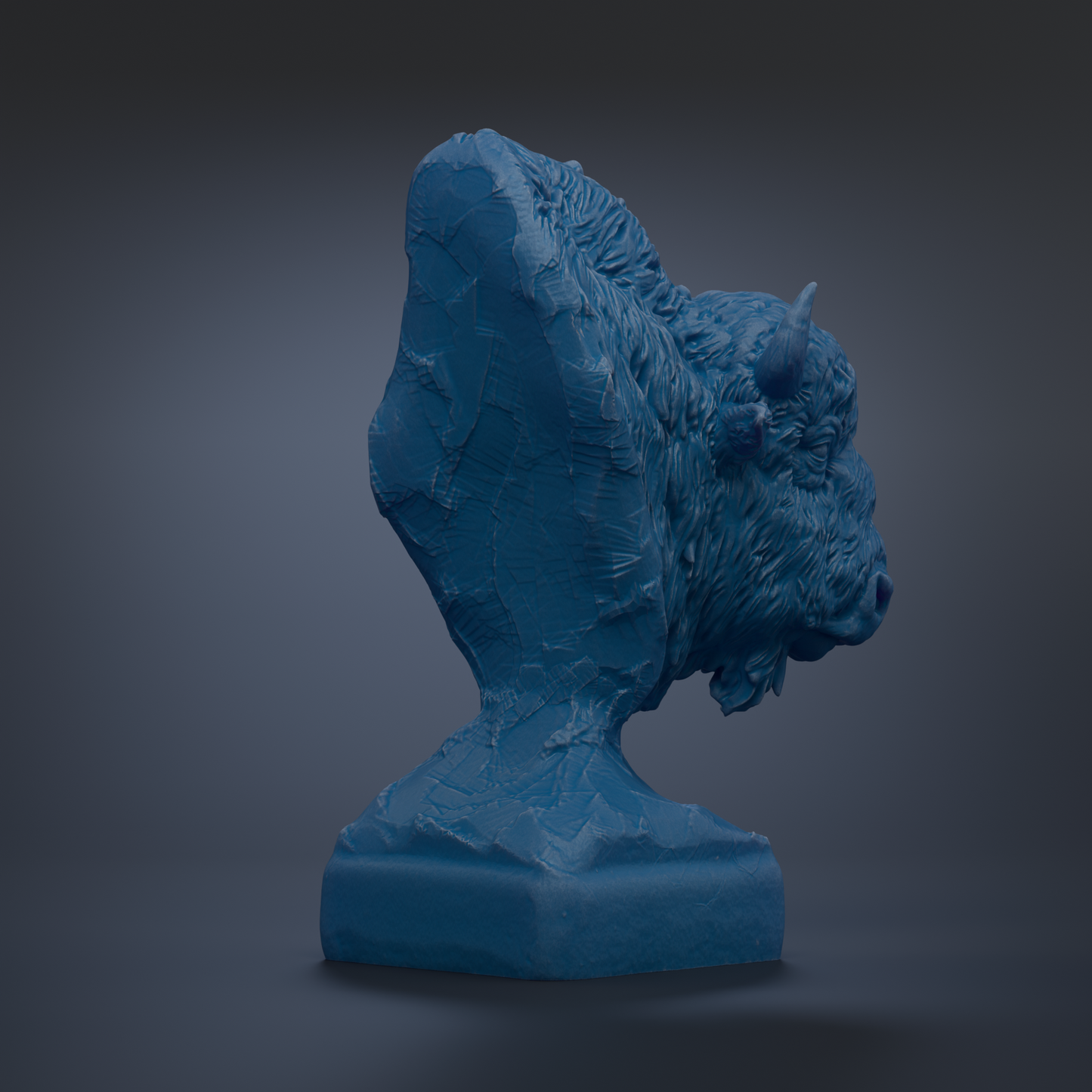 A blue, textured sculpture of a bison head is displayed against a dark background.