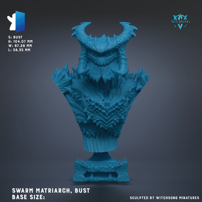 a bust of a creature with horns and a fierce expression, likely a mythical or fantastical creature. The creature is depicted in a blue color, which contrasts with the dark background. The bust appears to be a bust of a creature, possibly a dragon or a similar mythical being. The image does not contain any text, and the creature is the main focus.