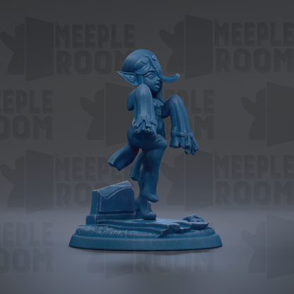 A blue figurine of a character with a pointed hat and long hair, standing on a base with a small object on it, against a dark background with repeated text.