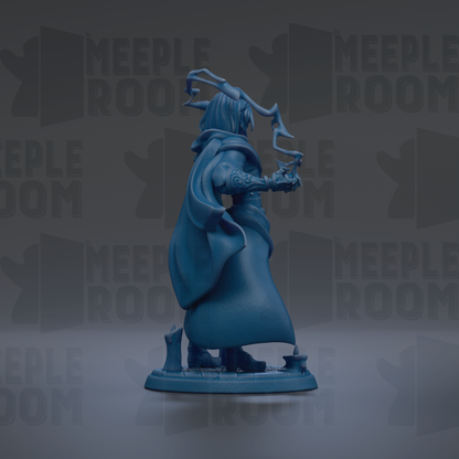 A blue figurine of a person with a flowing cape and a large headdress, standing on a base and holding a weapon.