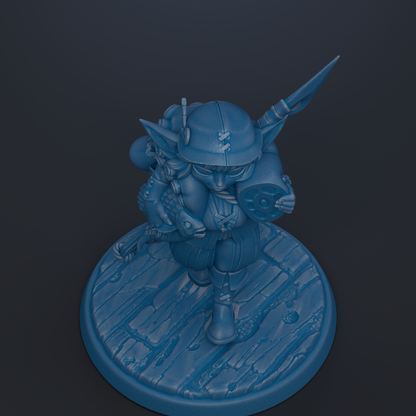 A blue figurine of a character with a pointed hat and a backpack, standing on a circular base.
