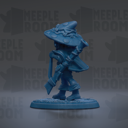 A blue figurine of a person wearing a hat with a mushroom-like design, holding a pipe and standing on a base.
