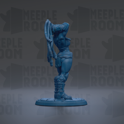 A blue figurine of a female character with a raised arm and legs, standing on a base.