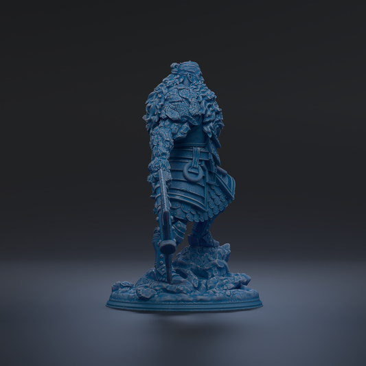 A blue, 3D-rendered statue of a figure standing on a base, with intricate details and a textured appearance.